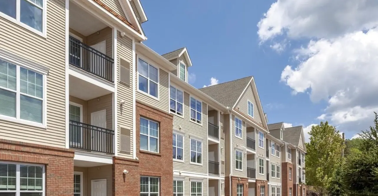 Multi-family apartment building exterior with balconies