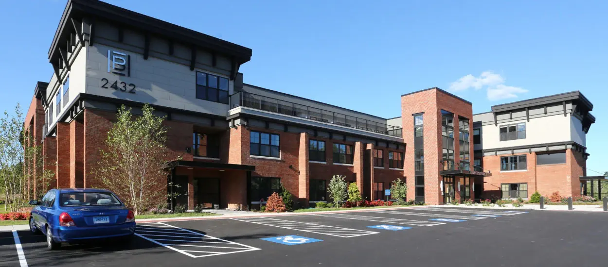 Mixed-use commercial building exterior completed by Victoria Building LLC